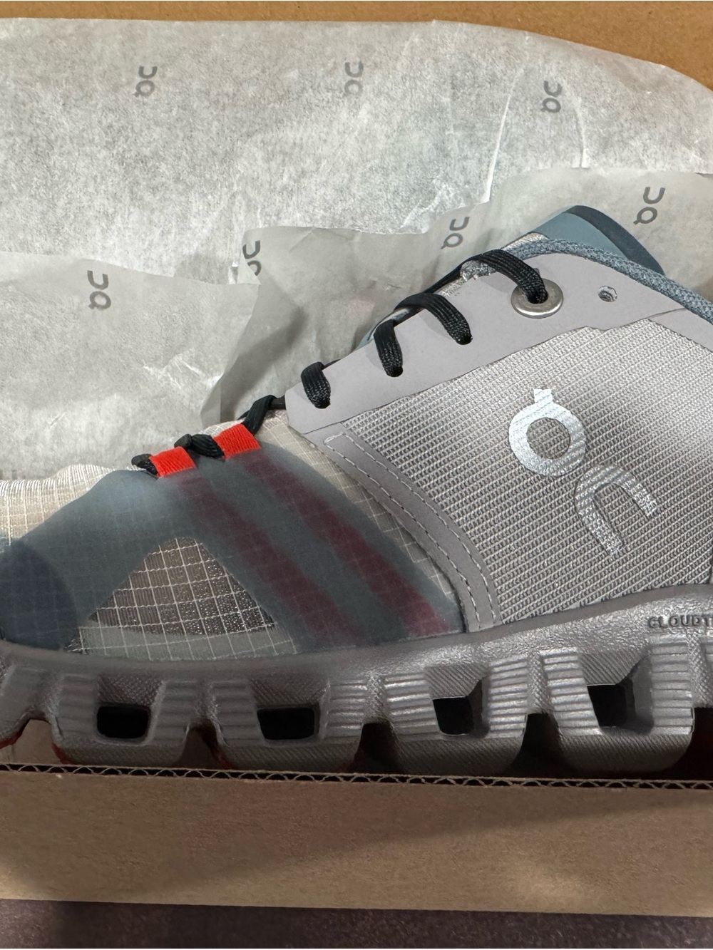 On Running Men’s Athletic Cloud Shoe — Gray with Red Accents